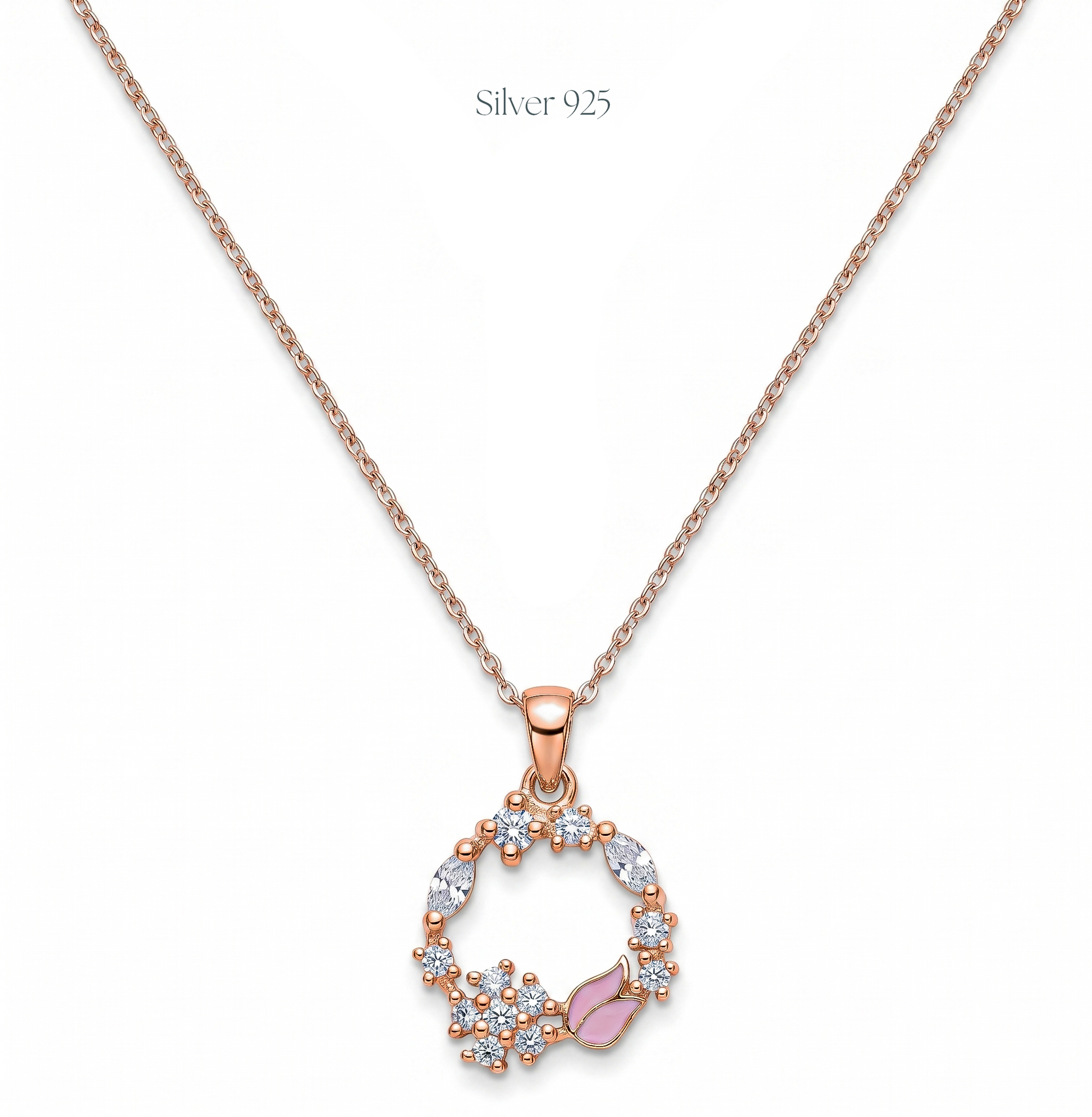 Rose gold necklace with a circular pendant featuring crystals and a pink gemstone on a white background.