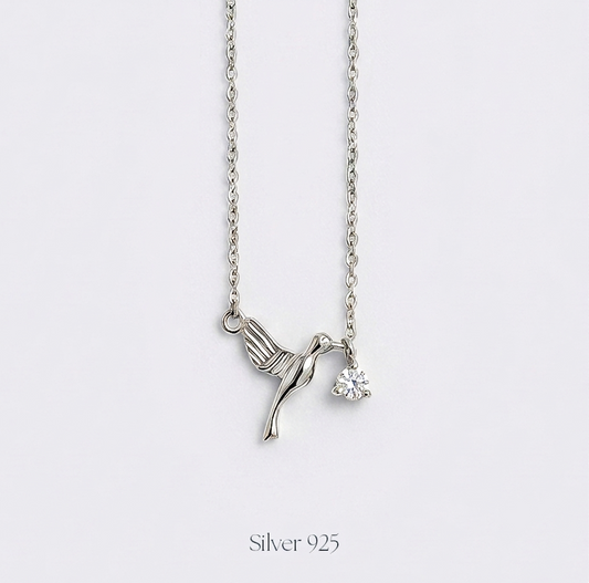 Minimal humming bird silver pendant